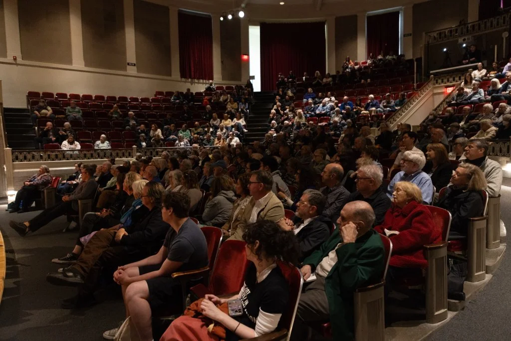 audience listening to an event in the lecture hall of the Carnegie Library of Pittsburgh