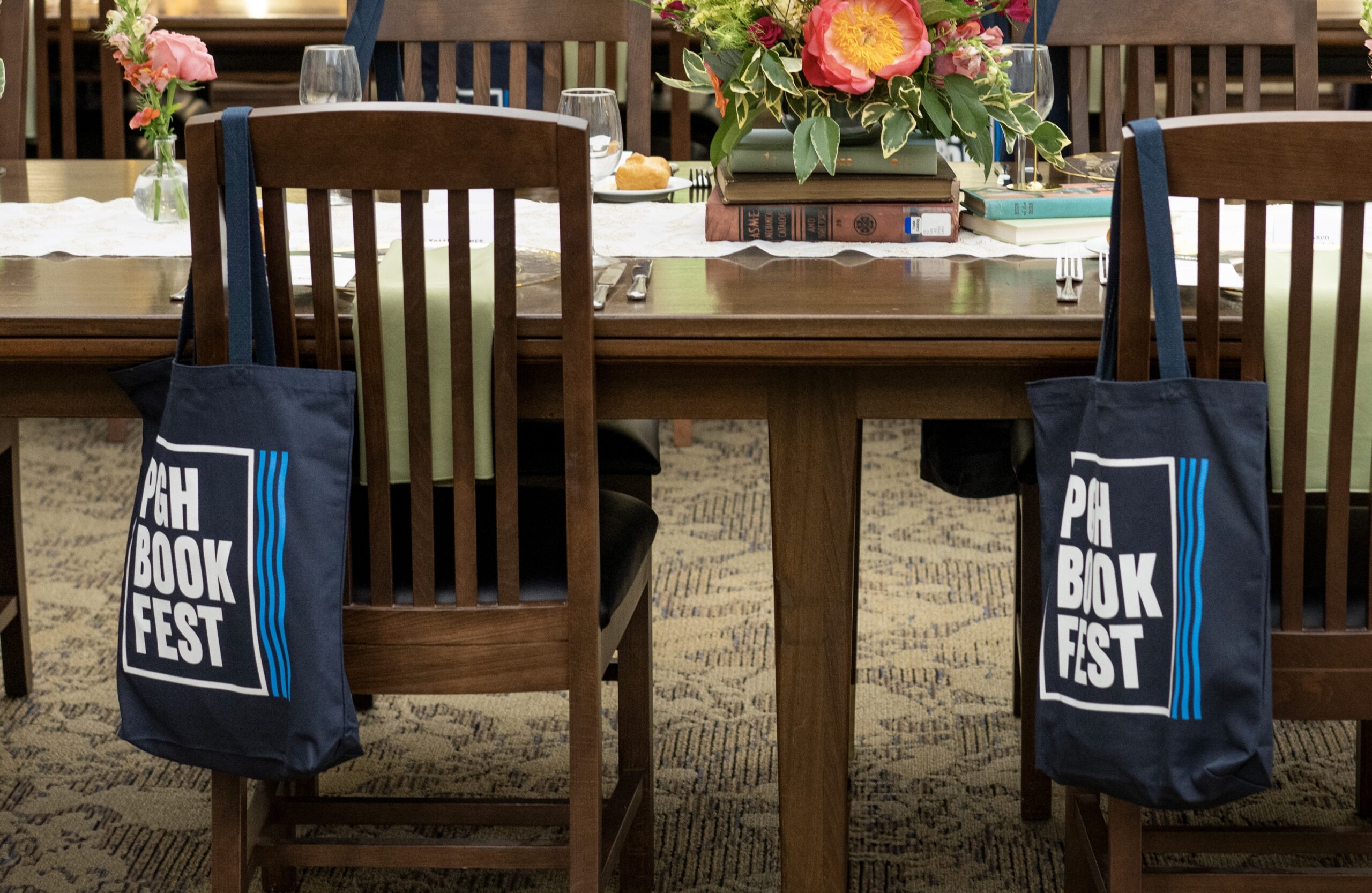 Photo of chairs with Carnegie Library of Pittsburgh Merchandise on them